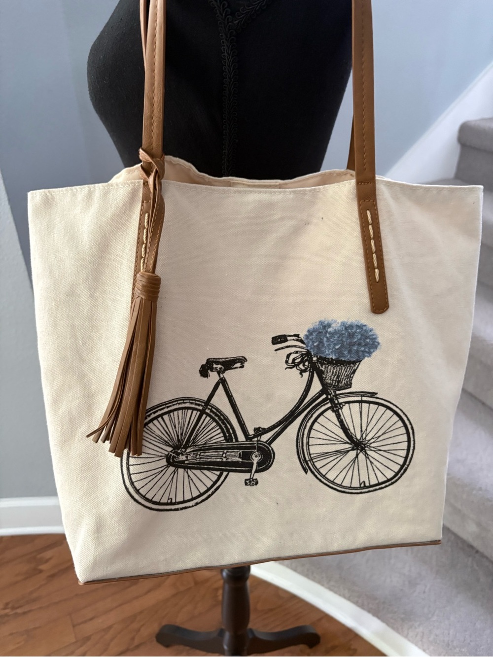 Cream Canvas Tote with Brown Handles and Blue Basket Accent